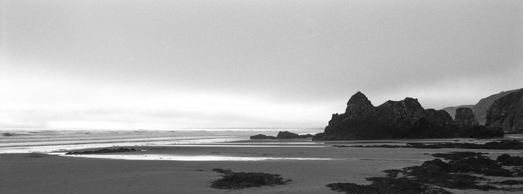 Beach and rocks at Low Tide, St.Cyrus, Aberdeenshire. Monochrome Film