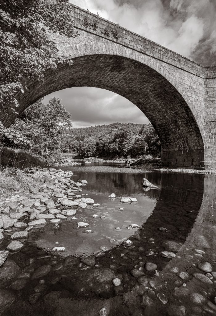 Striking monochrome image of the Potarch Bridge in Royal Deeside near Banchory, Scotland